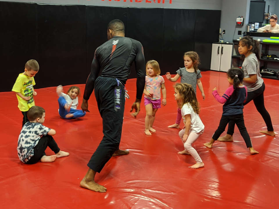 Photo of Emanuel Carey teaching kids' Brazilian Jiu-Jitsu class at Indiana Brazilian Jiu-Jitsu Academy